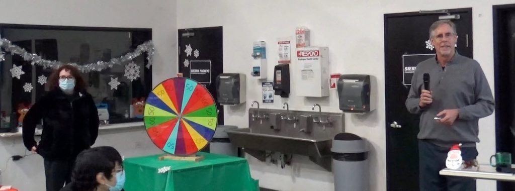 Spin-the-wheel prize game during luncheon