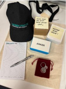 Scholarship swag: hat, notepads, brain teasers, tote bag